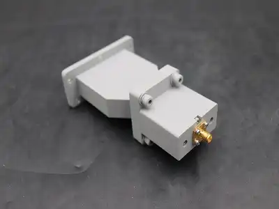 How does a waveguide power divider achieve microwave signal division? How does a waveguide power divider achieve microwave signal division?